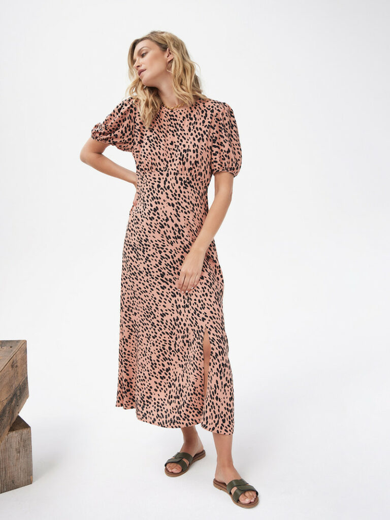 A leopard print midi dress is the perfect winter work dress
