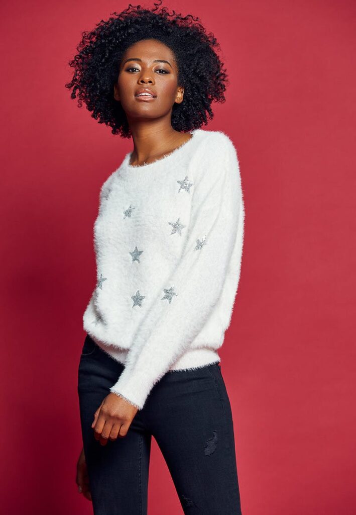 This sophisticated star number is one of the best Christmas jumpers for low-key festive style.