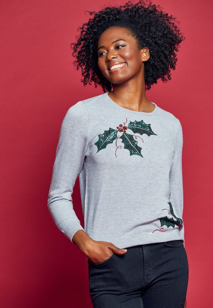 Win at Christmas with this women’s sequin holly jumper.